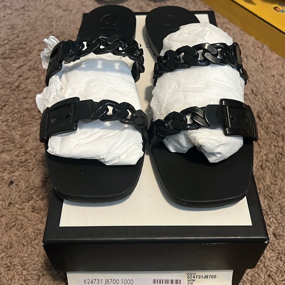 Black Gucci sandals